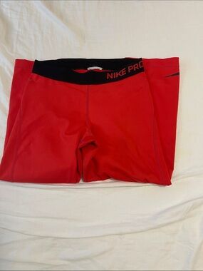 Nike Pro Red Athletic Compression Shorts with Black Waistband